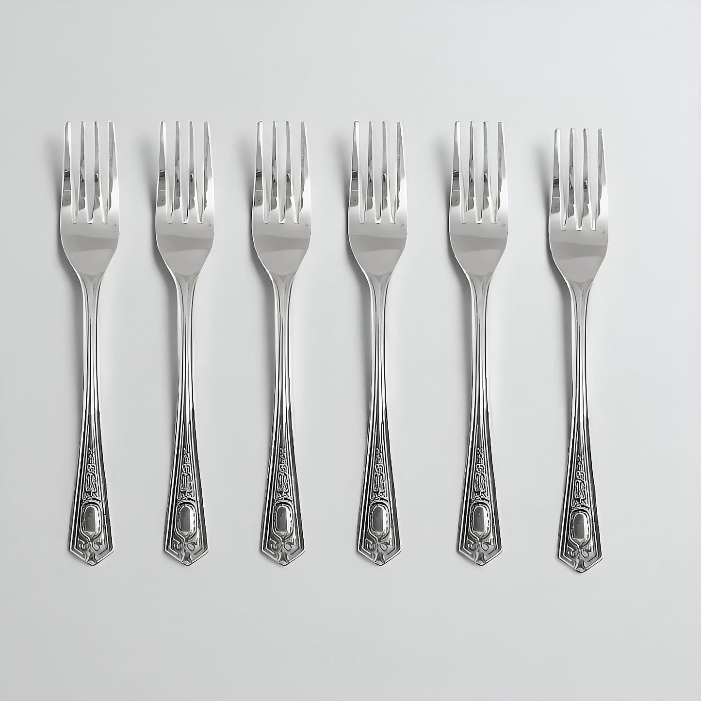 Set of 6 Kishco stainless steel dinner forks from the Festival collection, featuring ornate English handle detailing.