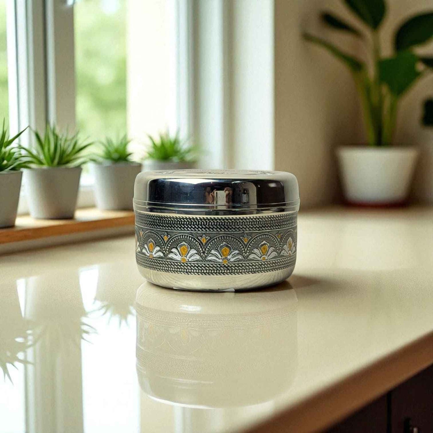 Mirror Antique Stainless Steel Half Dabba 1.5L with intricate traditional design by Mirror placed on kitchen counter