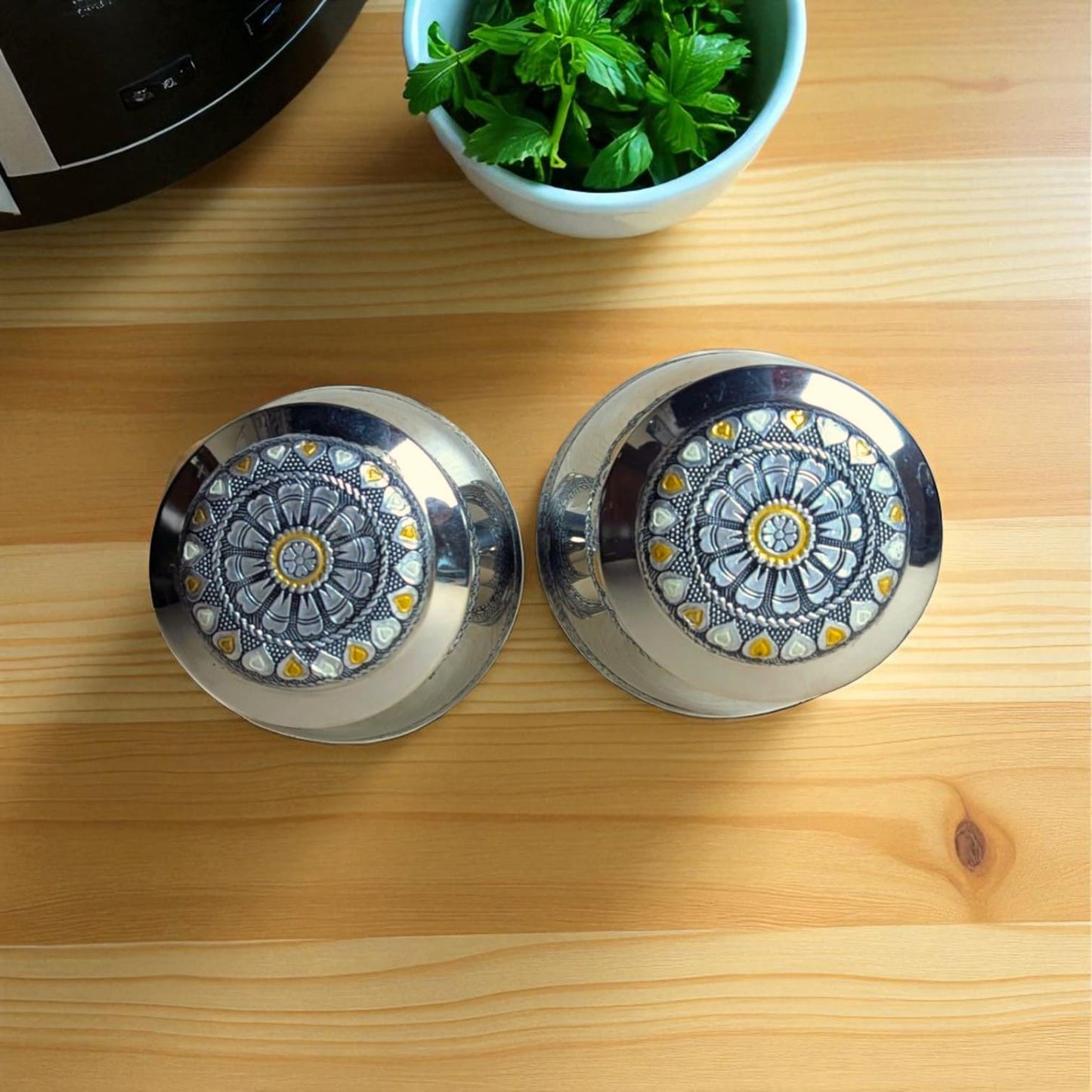 Mirror brand Antique Tea and Sugar Canisters with decorative floral lids on wooden surface