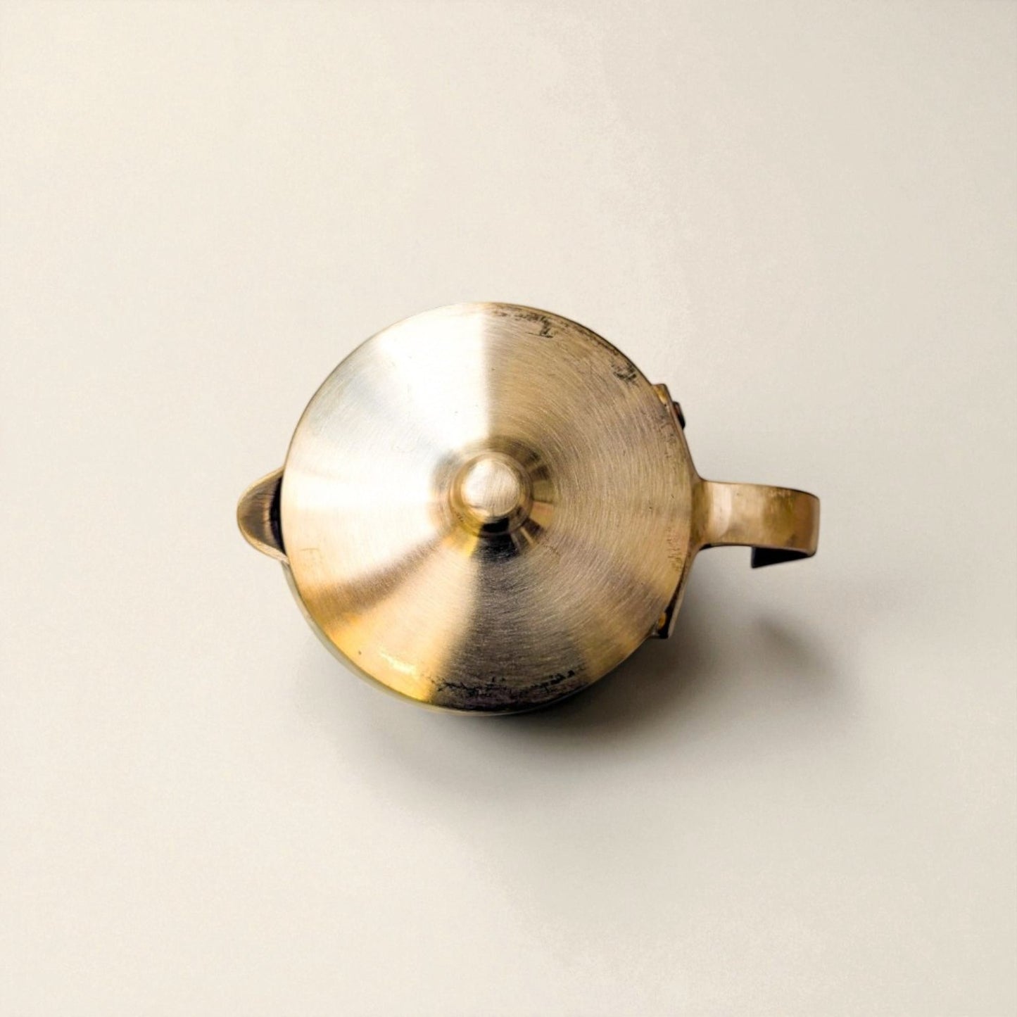 Bronze Kansa jug damru shape 1500ml with a polished surface and stylish handle from Kansyam