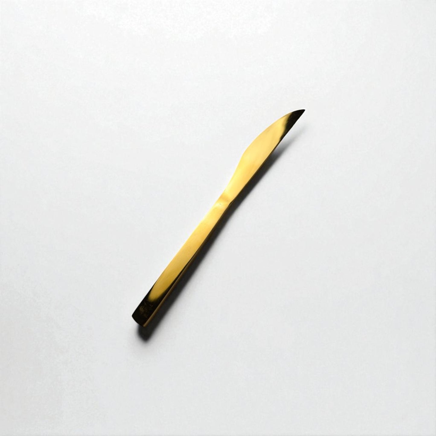 Kishco Cutlery Gold PVD Dinner Knife with sleek gold finish on white background