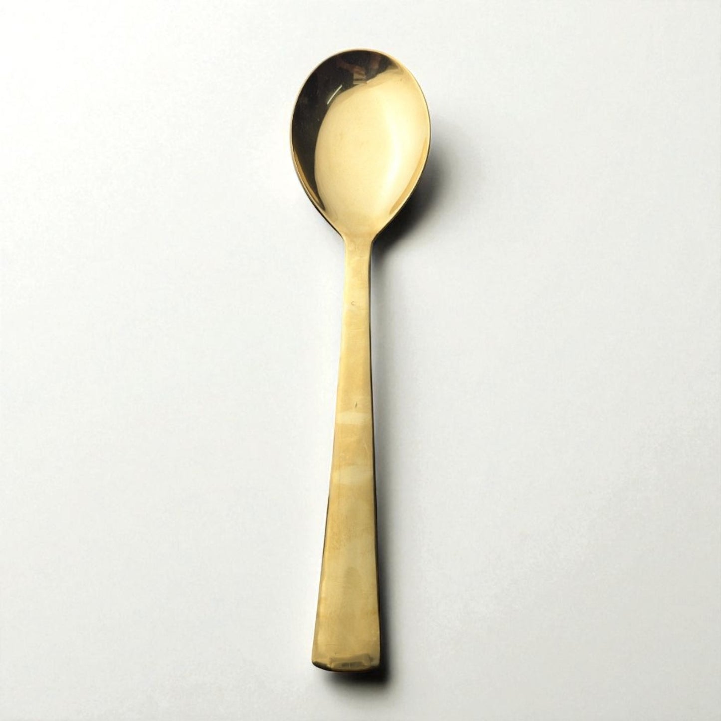 Kishco Cutlery Gold PVD Serving Spoon Oval Large with sleek gold finish and elongated handle