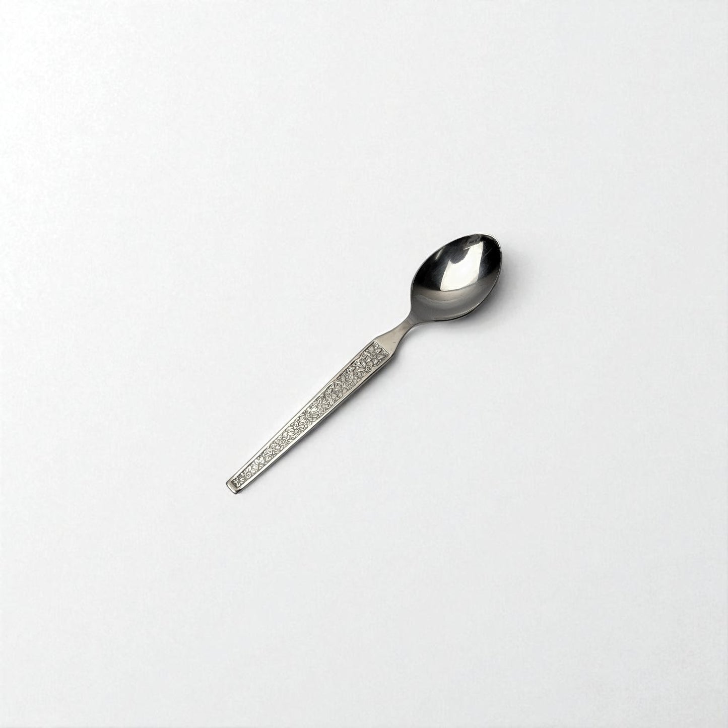 Kishco Cutlery Parma Coffee Spoon with ornate handle and polished stainless steel finish