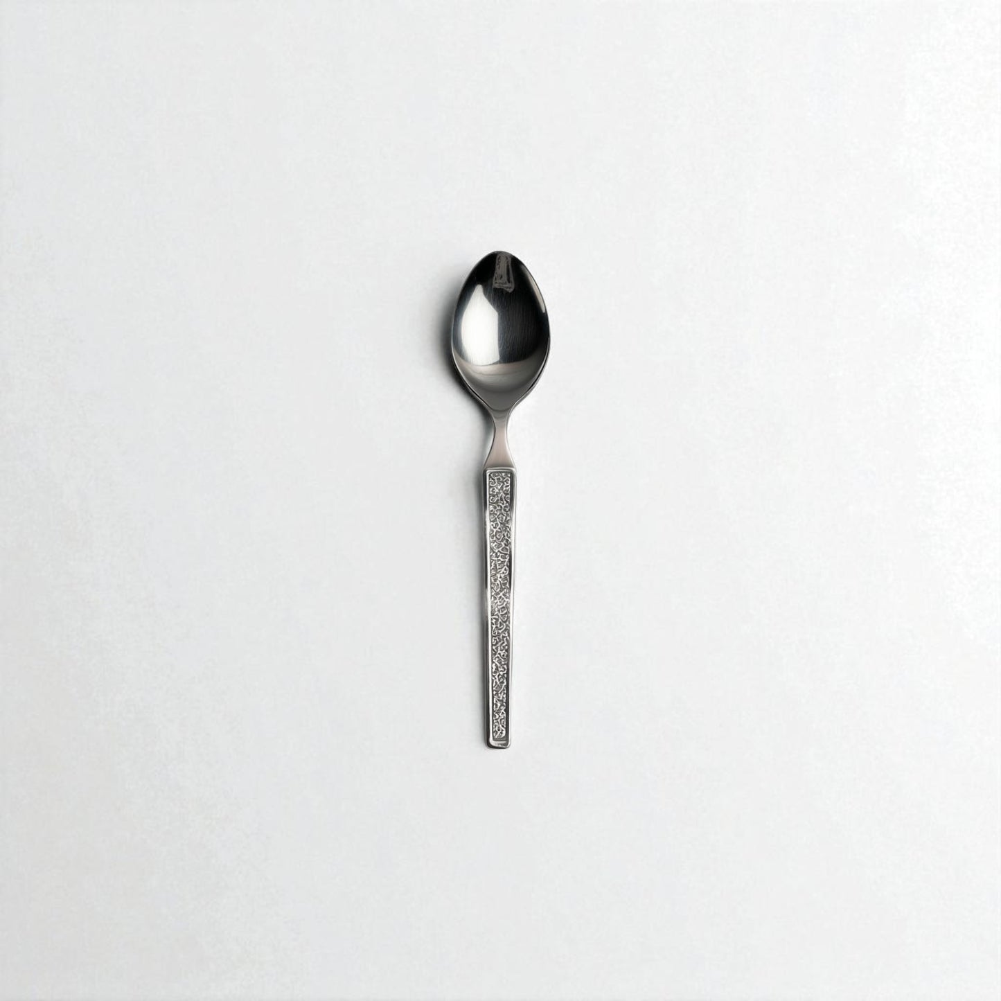 Kishco Cutlery Parma Tea Spoon with textured handle and polished stainless steel bowl