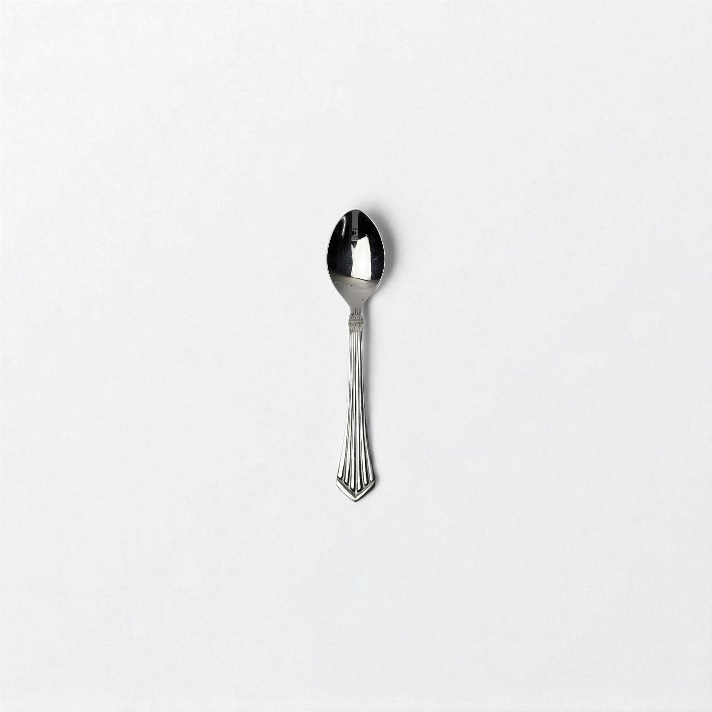 Kishco cutlery Symphony Tea Spoon stainless steel with elegant handle design on white background