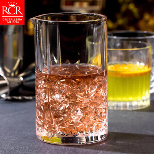 Various RCR Tattoo Crystal Mixing Glass drinks in a bar setting, highlighting versatile cocktail presentation