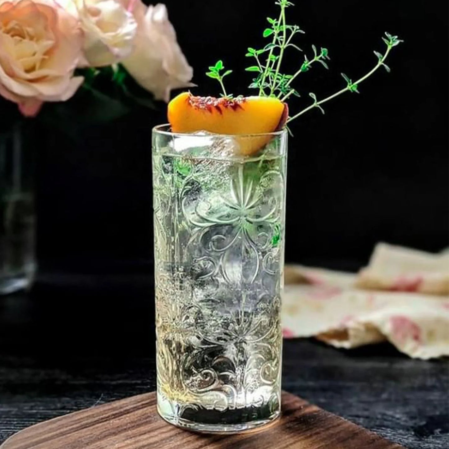 RCR Tattoo Highball Tumbler Glass, 368ml, Set of 6 with decorated design and garnished cocktail