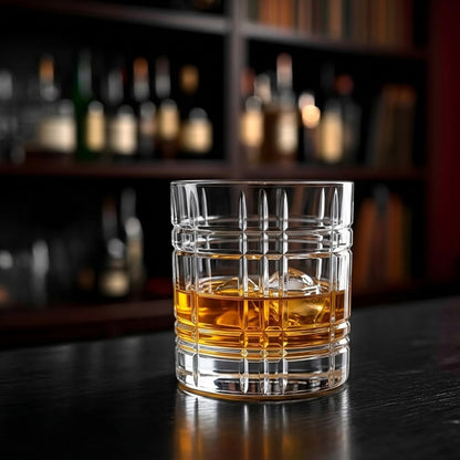 RCR Any DOF crystal whiskey glass with whiskey on ice at a bar