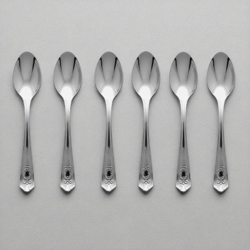 Set of 6 Kishco stainless steel baby spoons from the Festival collection, featuring ornate English handle detailing