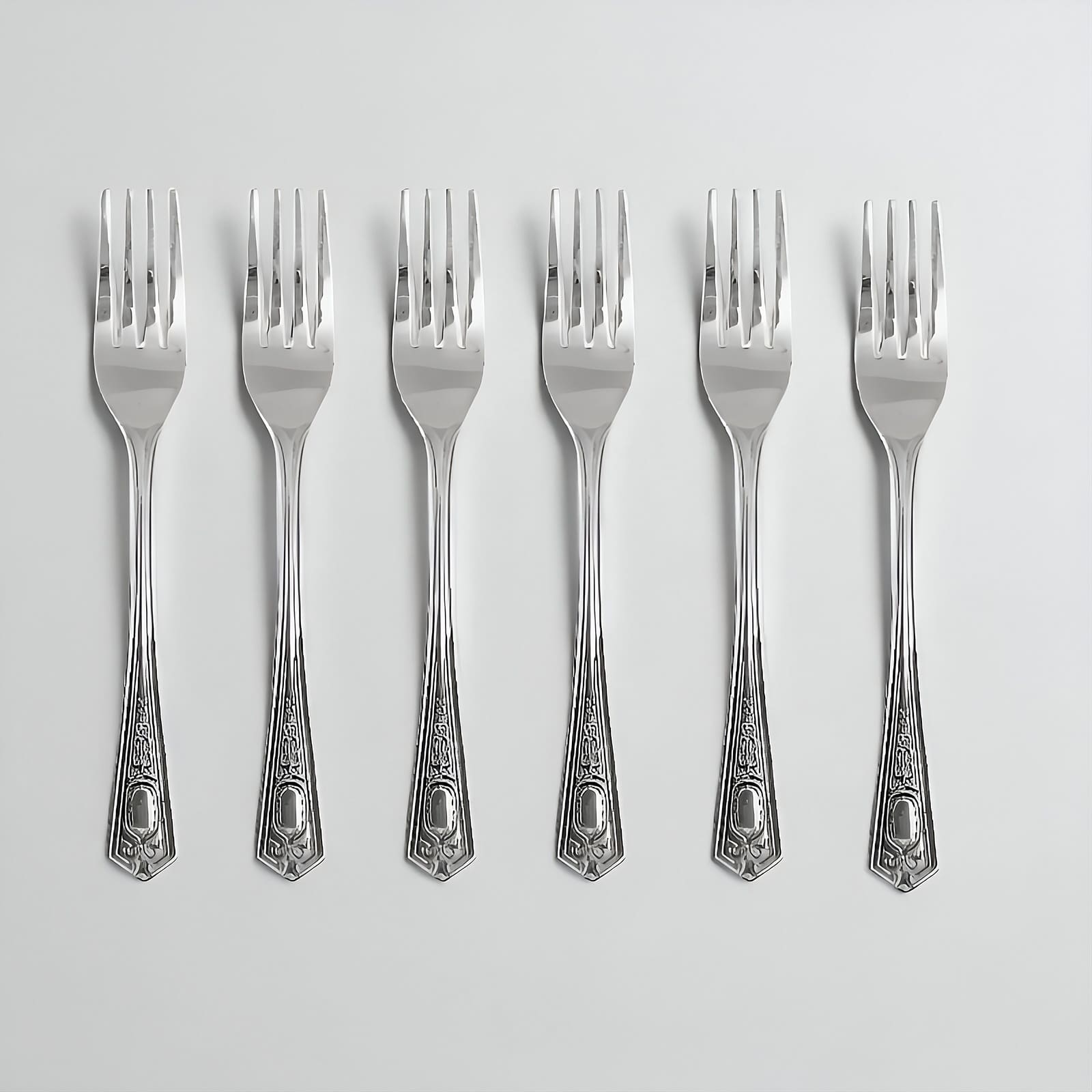 Set of 6 Kishco stainless steel dinner forks from the Festival collection, featuring ornate English handle detailing.