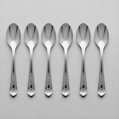 Set of 6 Kishco stainless steel dinner spoons from the Festival collection, featuring ornate English handle detailing.