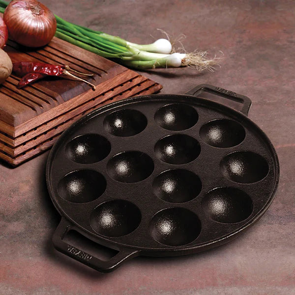 Meyer cast iron appam pan 26cm with 2 handles on kitchen countertop