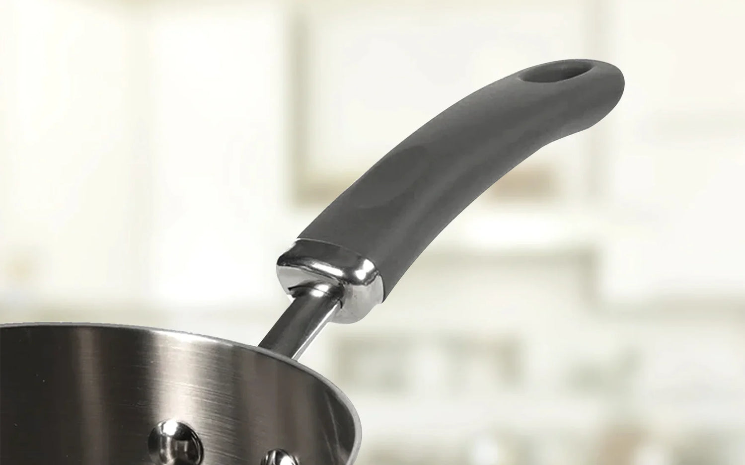 Meyer Trivantage milk pan with stay-cool handles for safe and convenient cooking