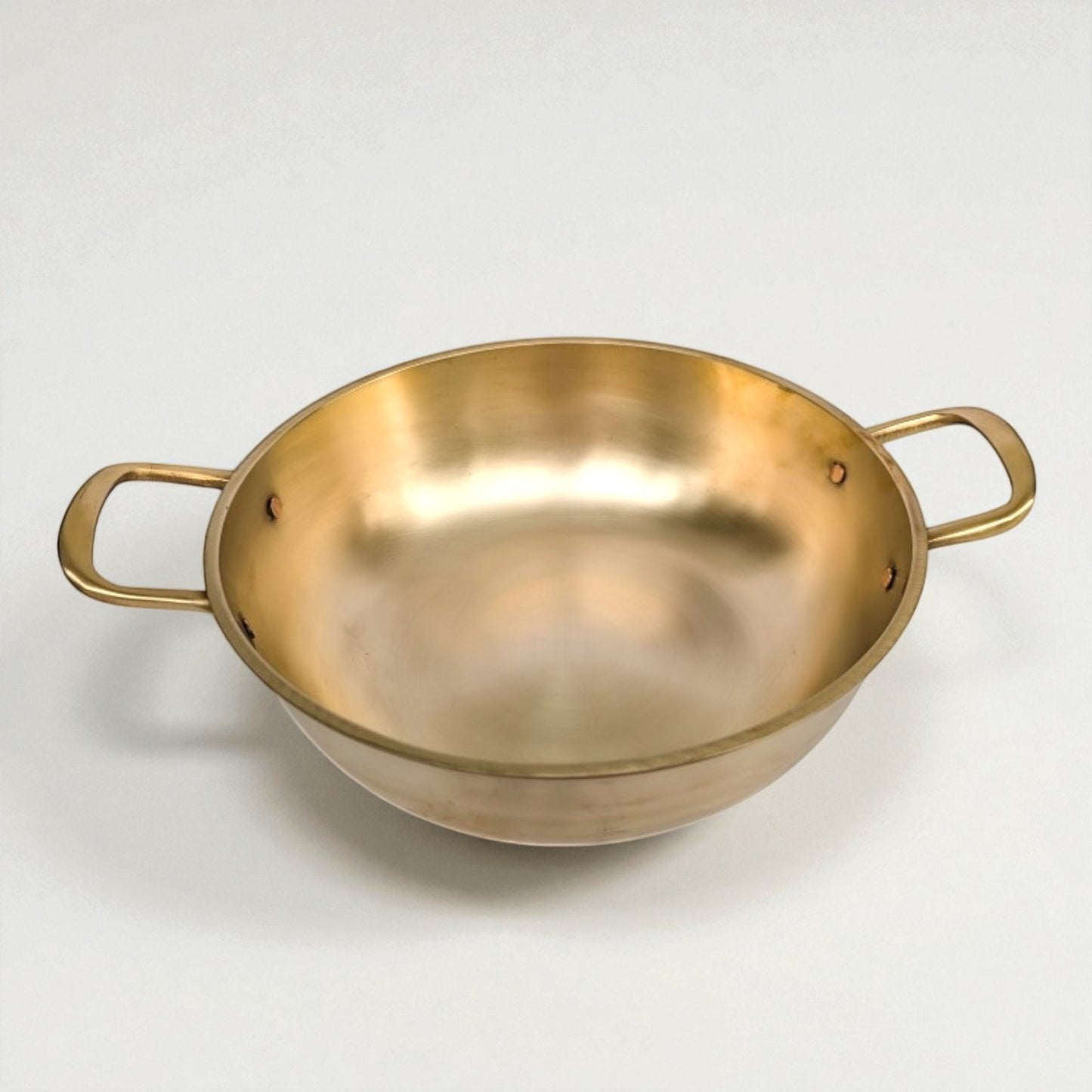 Bronze Kansa Kadai with sturdy handles for traditional Indian cooking and serving.
