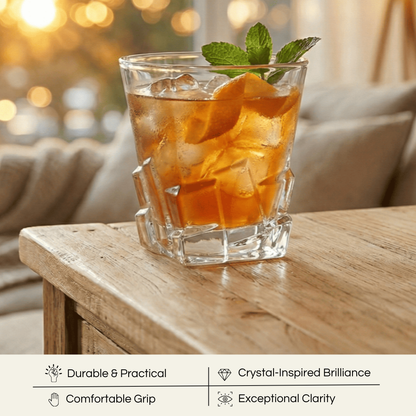 Celestial Lucent Premium Whiskey glasses on a wooden table with ice and garnishes for an elegant drink experience
