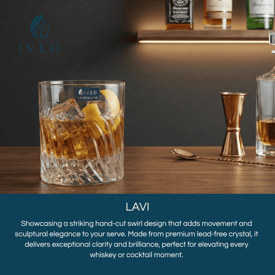 Iveo Crystalline Lavi Crystal Whisky Glass featuring hand-cut swirl design with whiskey and lemon