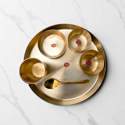 kansyam kansa dinnner set & thali hammerred finish bird view on a marble