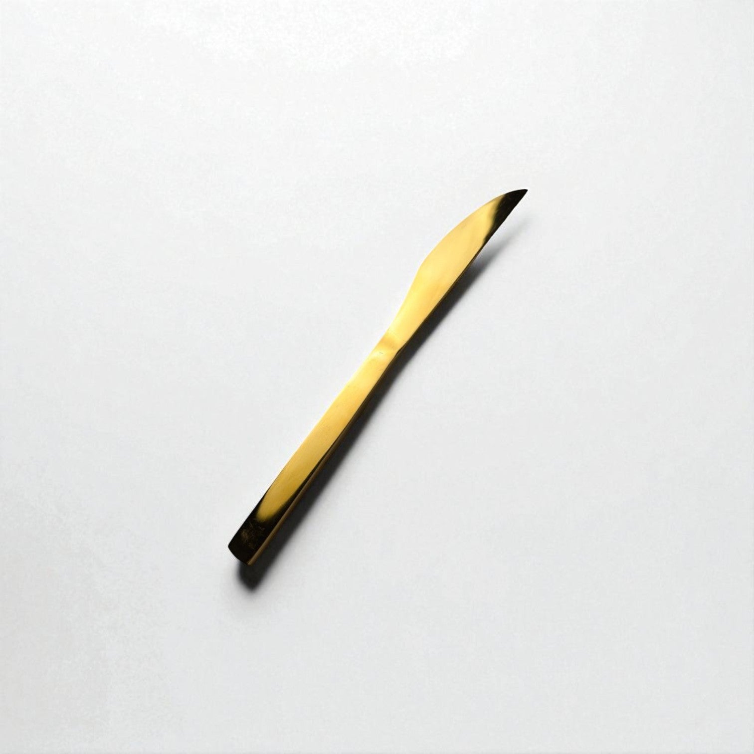 Kishco Cutlery Gold PVD Dinner Knife with sleek gold finish on white background