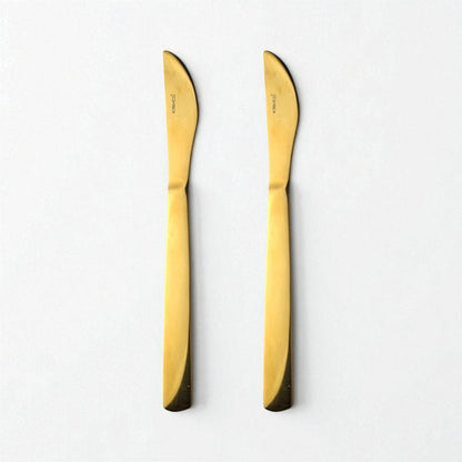 Two Kishco Cutlery Gold PVD Dinner Knife set with sleek gold finish and modern design