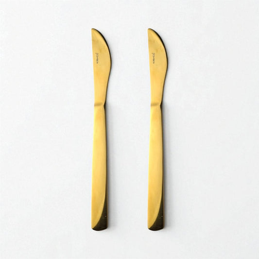 Two Kishco Cutlery Gold PVD Dinner Knife set with sleek gold finish and modern design