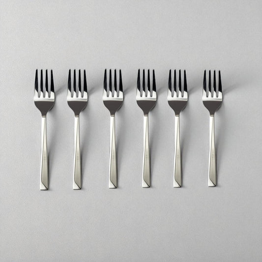 Set of six Kishco Cutlery Olympus Baby Forks with stainless steel polished finish on light background