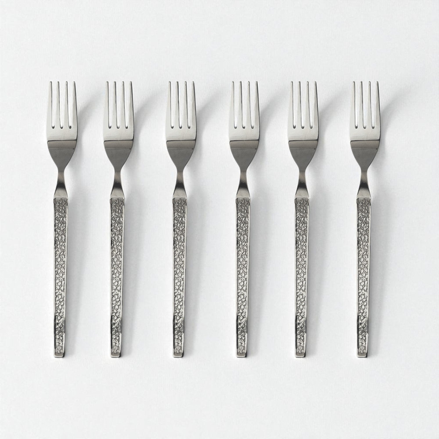 Set of six Kishco Cutlery Parma Dinner Forks with textured handles arranged on white background