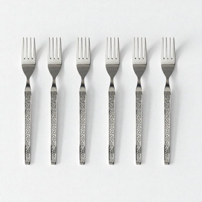 Set of six Kishco Cutlery Parma Dinner Forks with textured handles arranged on white background