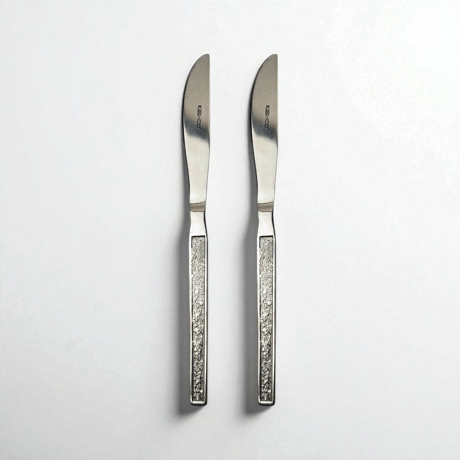 Two Kishco cutlery Parma Dinner Knife stainless steel dinner knives with textured handles