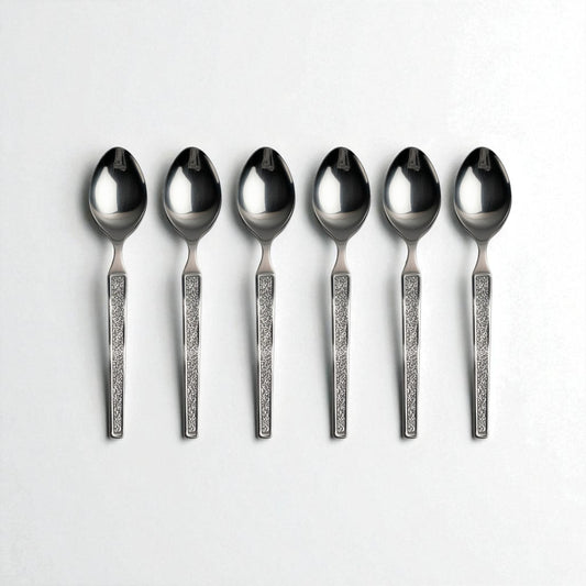 Set of six Kishco Cutlery Parma Tea Spoons with decorative textured handles on white background