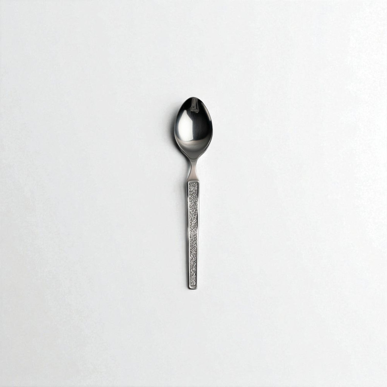 Kishco Cutlery Parma Tea Spoon with textured handle and polished stainless steel bowl