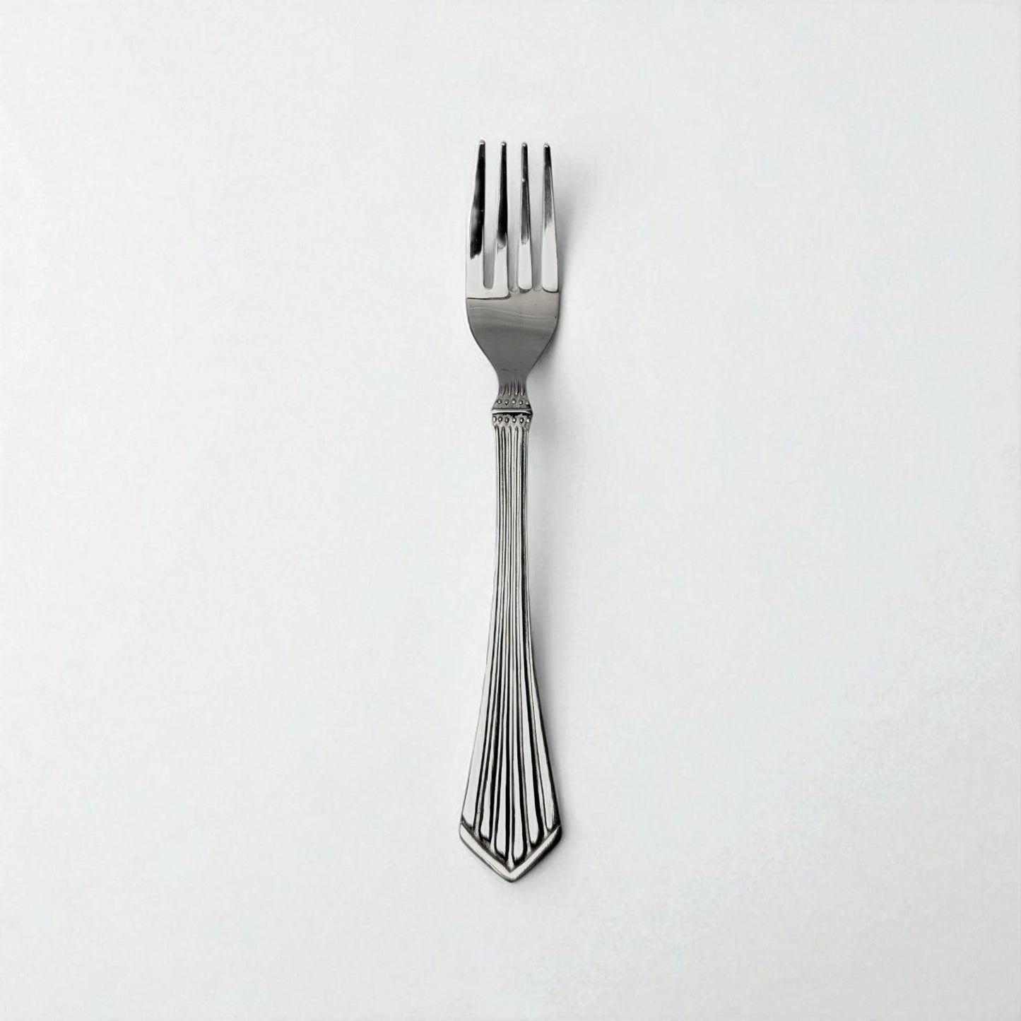 Kishco Cutlery Symphony Dinner Fork with decorative handle and polished stainless steel finish