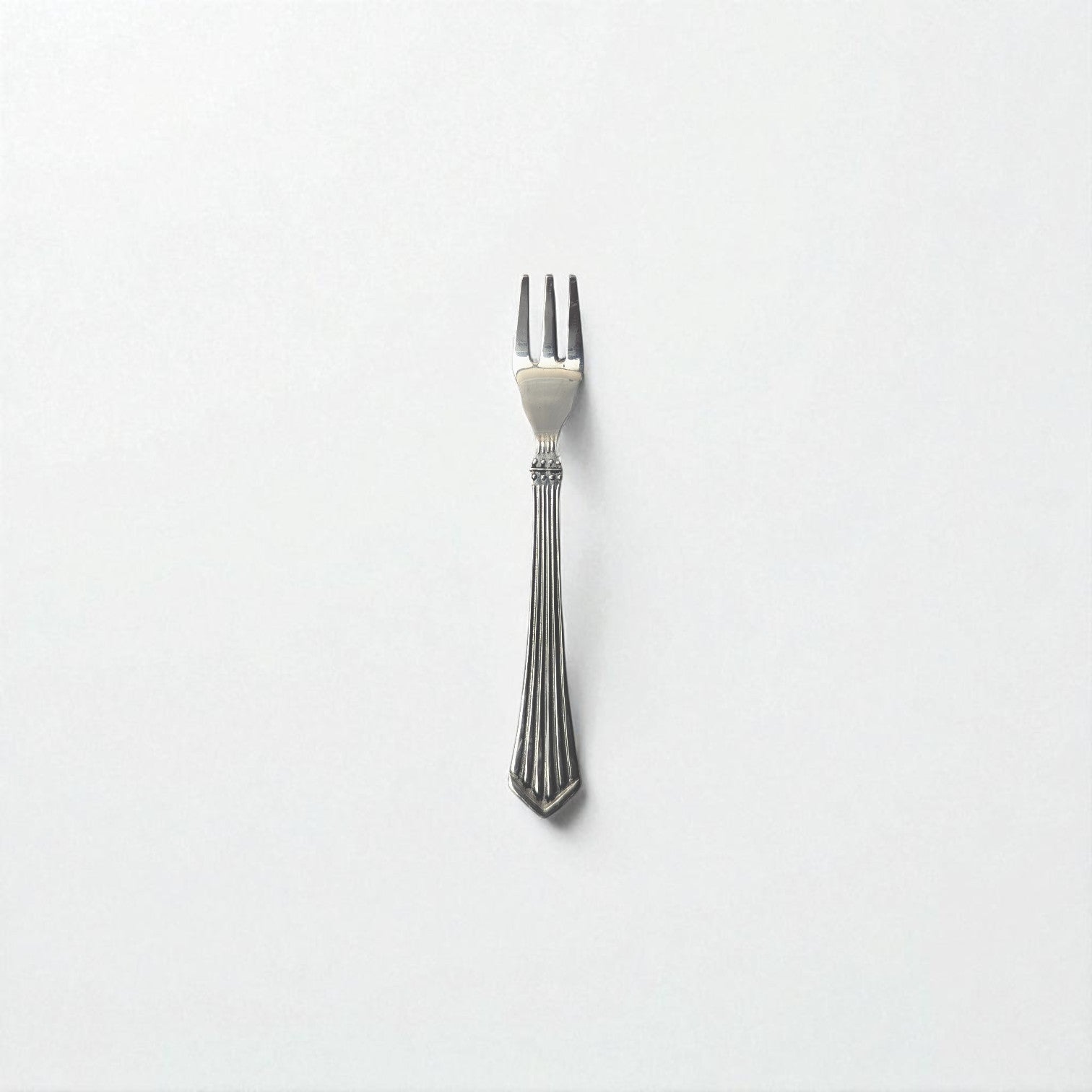 Kishco Cutlery Symphony Fruit Fork in stainless steel with elegant striped handle design