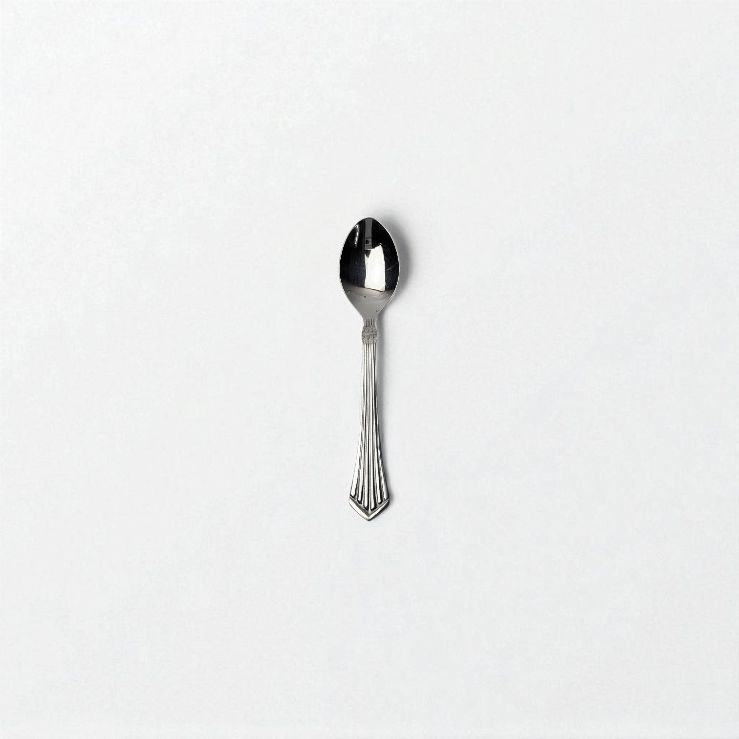 Kishco cutlery Symphony Tea Spoon stainless steel with elegant handle design on white background