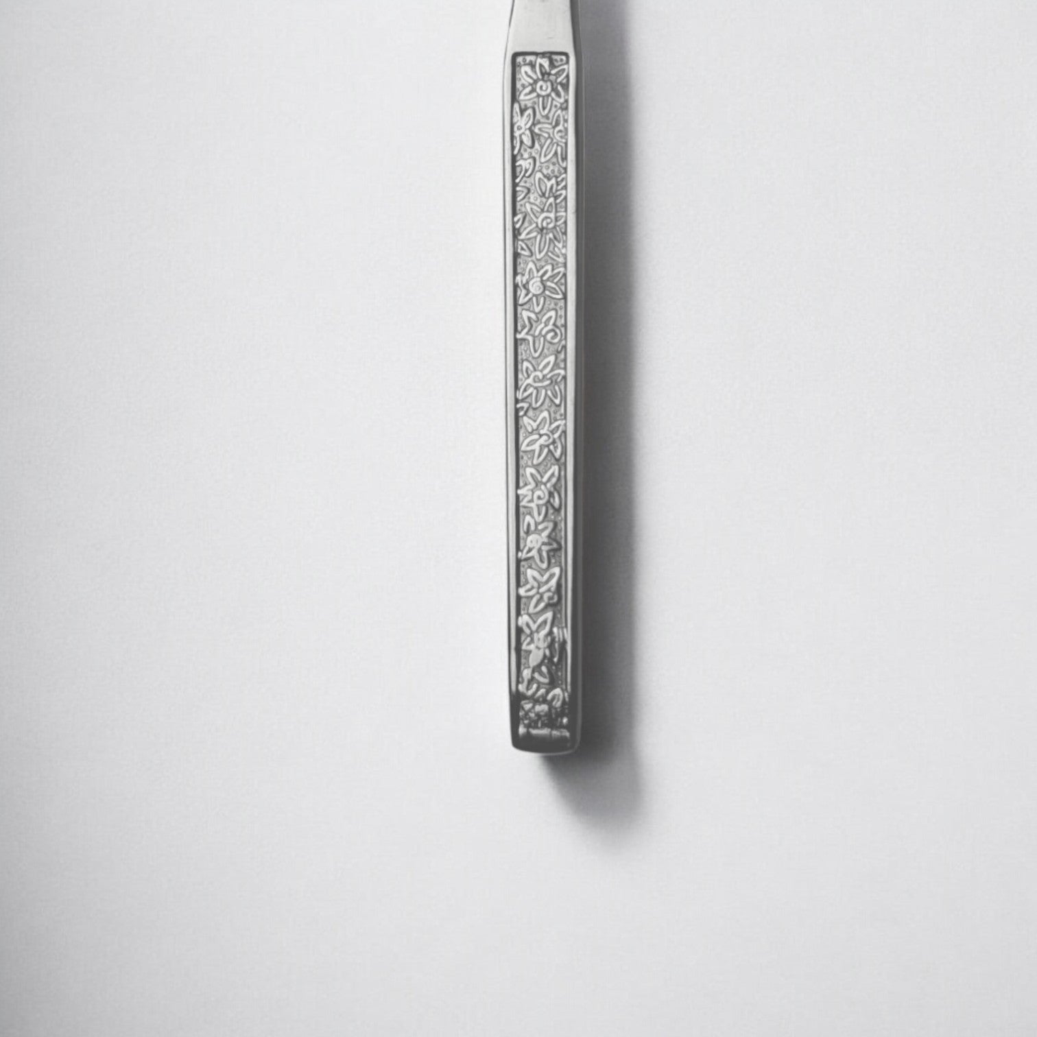 Kishco Parma Stainless Steel Serving Spoon Square with detailed floral pattern on handle