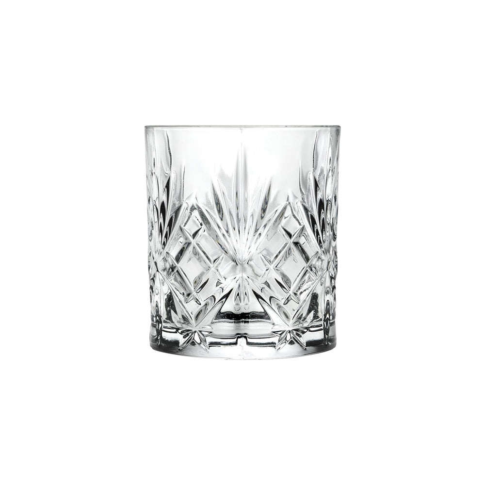 RCR Melodia DOF whiskey glass garnished with a fresh herb sprig.