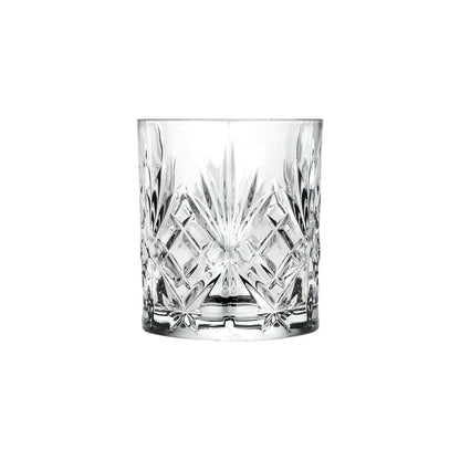 RCR Melodia DOF whiskey glass garnished with a fresh herb sprig.