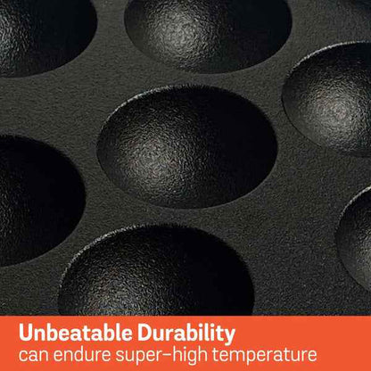 Close-up of Meyer Cast Iron Appam Pan with deep circular molds showing durable cast iron texture