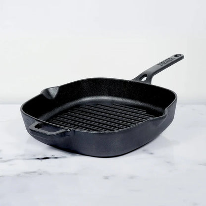 Meyer Cast Iron Grill Pan square shape with ridged cooking surface and handle on white marble background