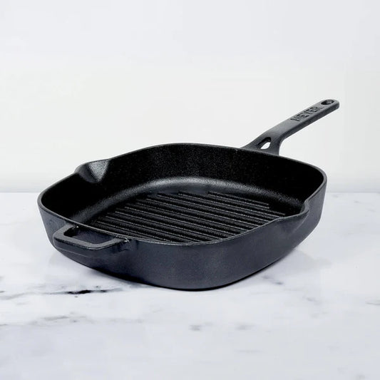 Meyer Cast Iron Grill Pan square shape with ridged cooking surface and handle on white marble background