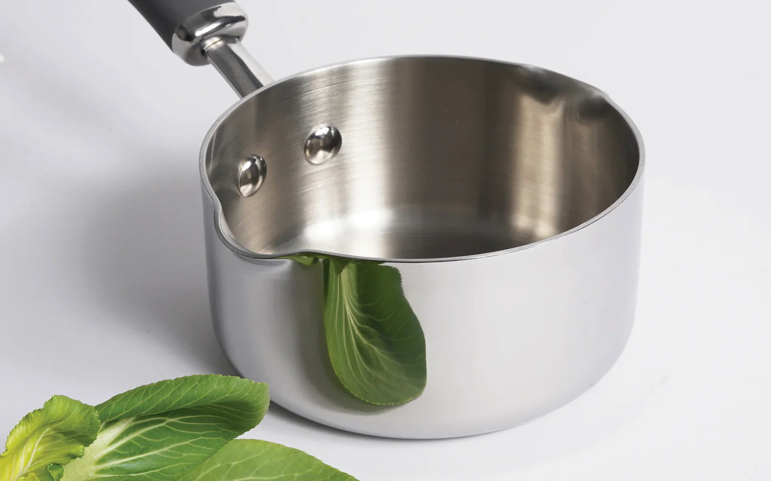 Meyer Trivantage milk pan with durable tri-ply construction detail
