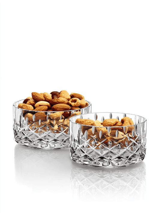 Nachtmann Noblesse Nut Bowl, Set of 2 with almonds against a white background