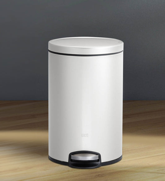 Obsessions Artistic Stainless Steel Dustbin 12 Ltr White with angled view and ergonomic pedal for hands-free use