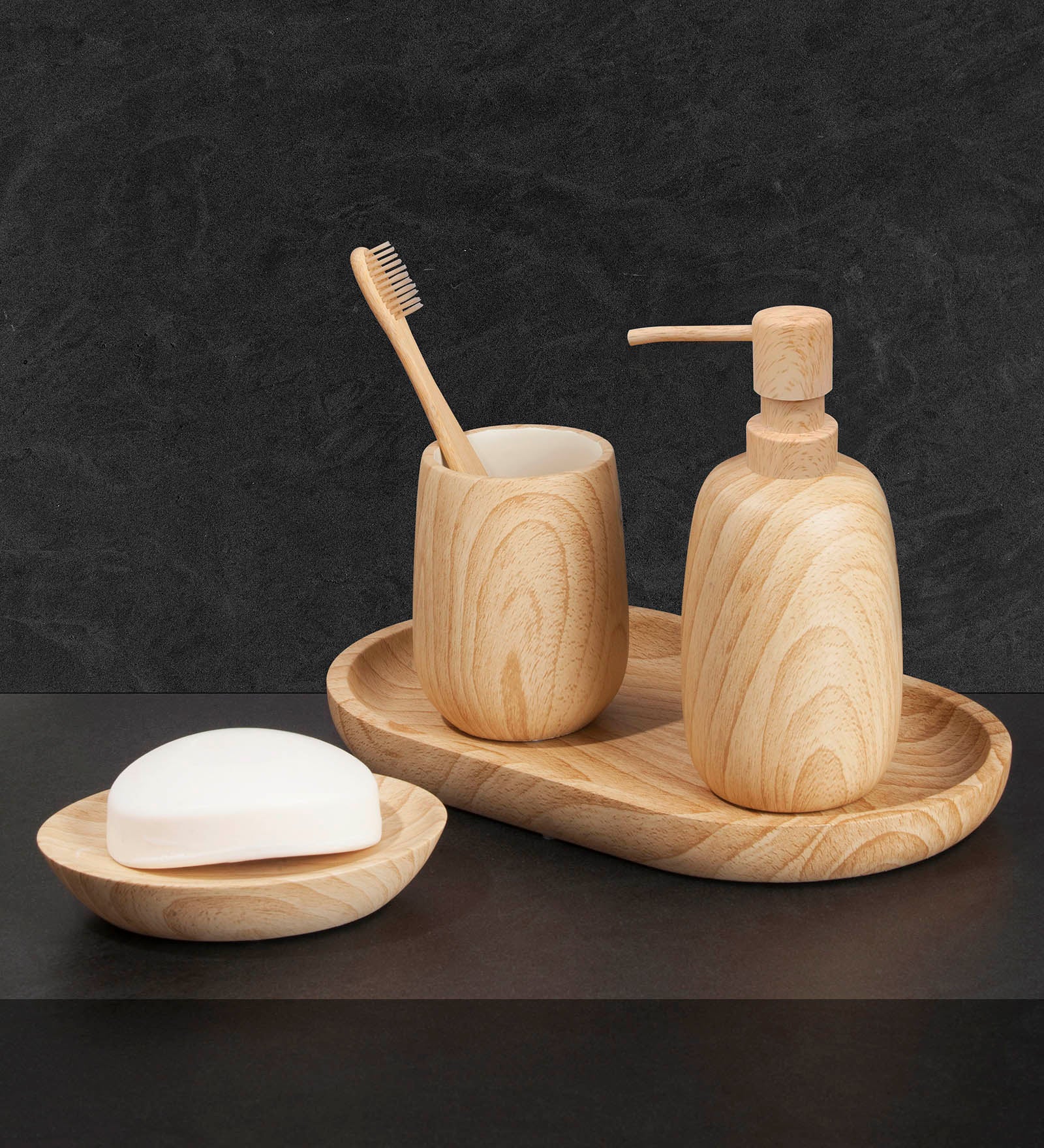 Obsessions Azure Polyresin bathroom set wood with a soap dispenser, toothbrush holder, and soap dish
