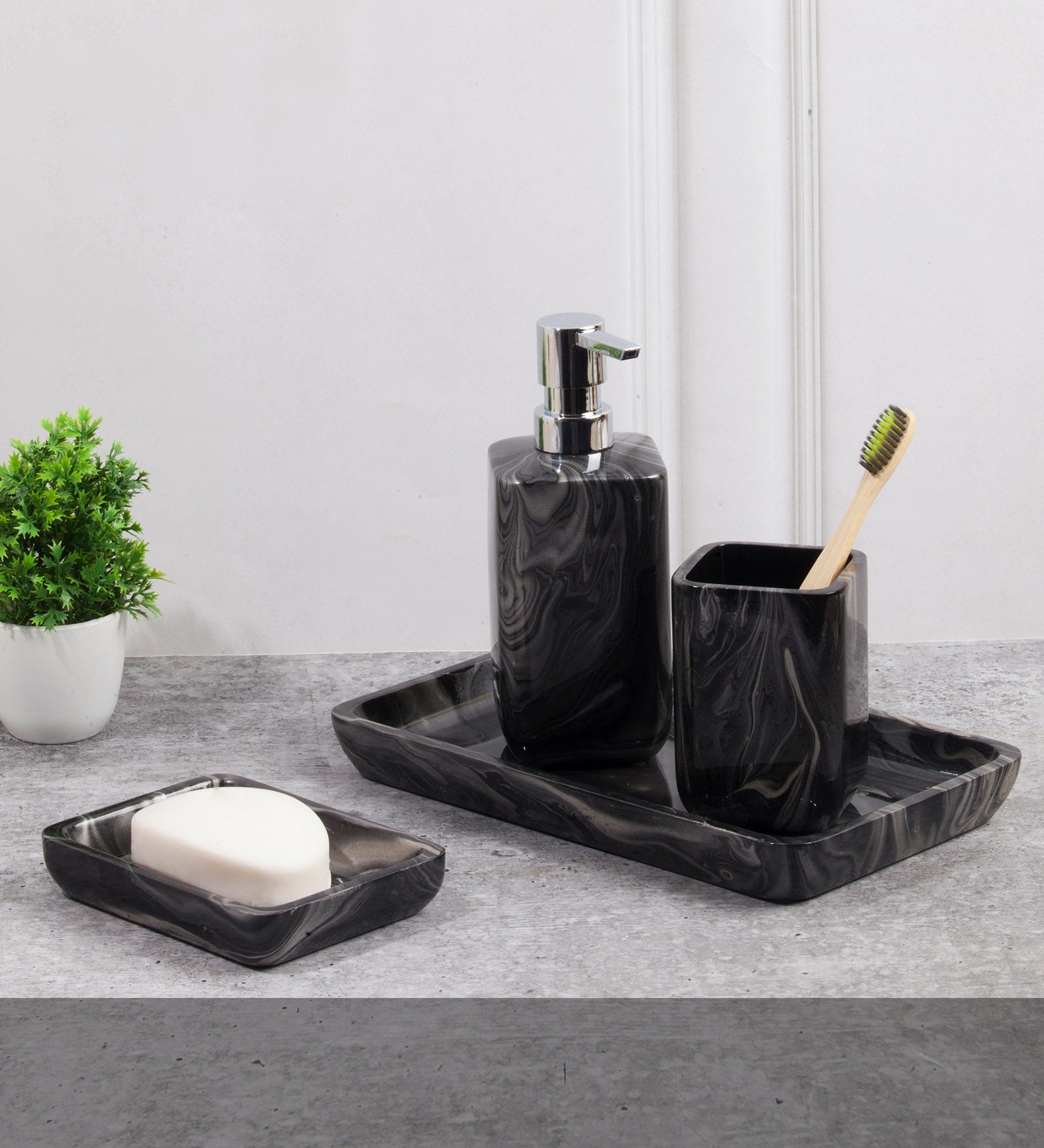 Obsessions azure polyresin black 4 pcs bathroom set with soap dispenser, toothbrush holder, and tray
