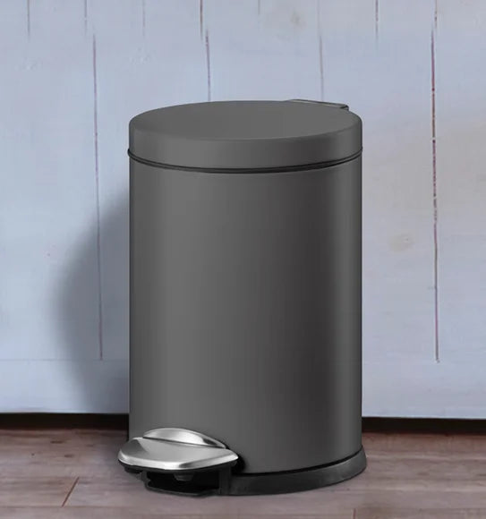 Obsessions Luna Eko 9219 stainless steel step dustbin, Titanium Grey, 3L, angled lifestyle view with pedal
