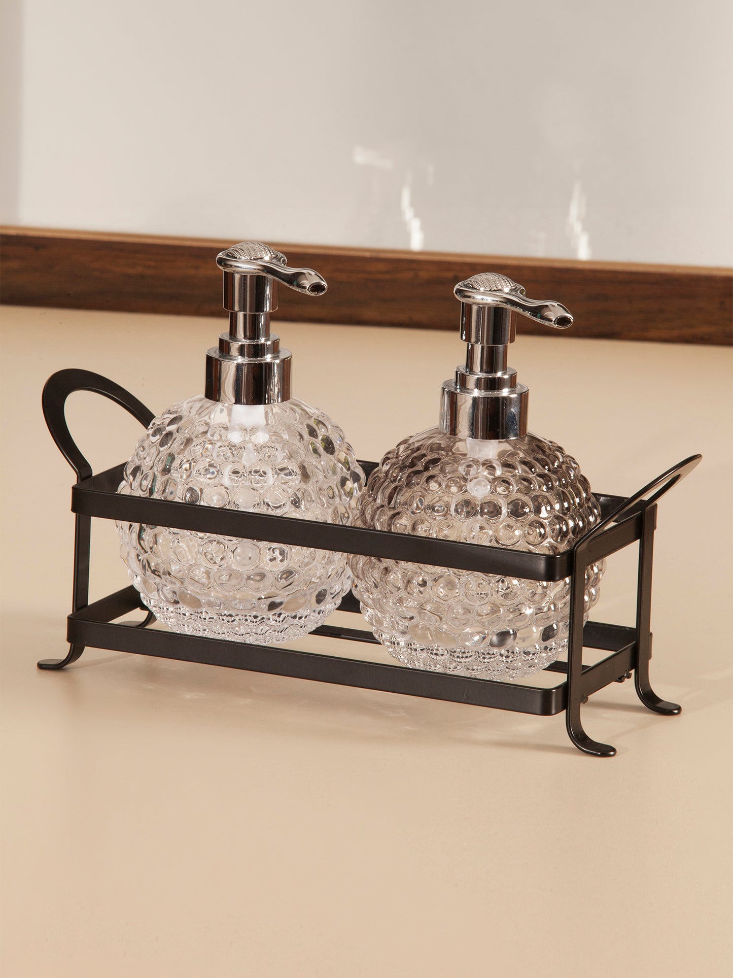 Obsessions prism glass bathroom set twin with decorative pumps in a stylish metal holder
