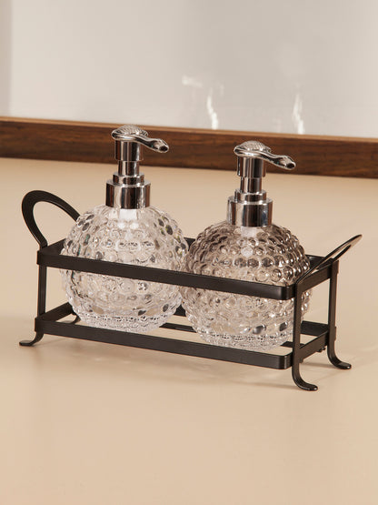 Obsessions prism glass bathroom set twin with decorative pumps in a stylish metal holder