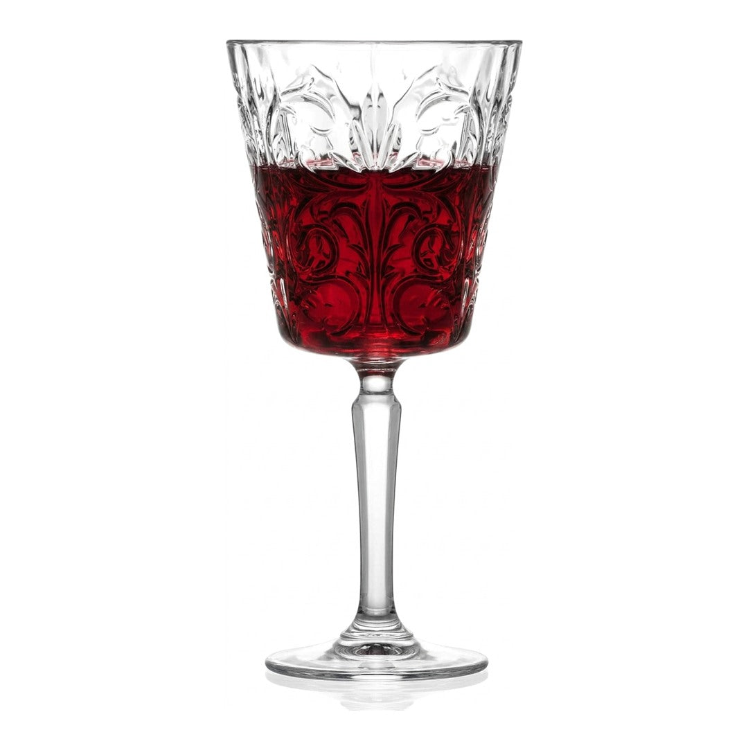 RCR Tattoo Wine Goblet Glass, 290ml, elegant crystal goblet filled with red wine, on white. Part of a set of 6