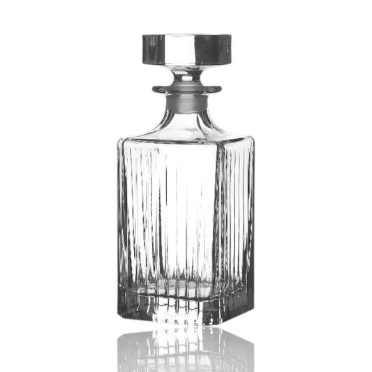 RCR timeless whiskey decanter featuring a classic design with vertical cuts and a sleek stopper