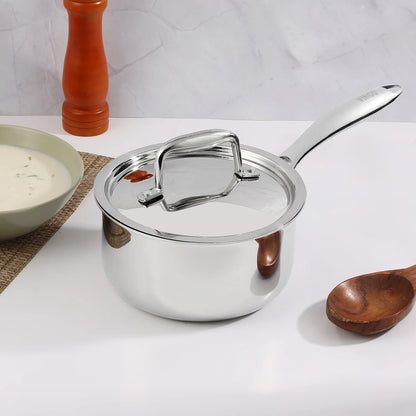 Vinod Platinum Triply Stainless Steel Saucepan 18cm 2.2L with lid and wooden spoon on kitchen countertop